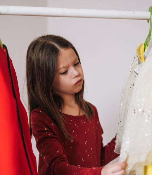 little-girl-with-long-dark-hair-in-red-dress-among-2024-10-18-04-16-20-utc